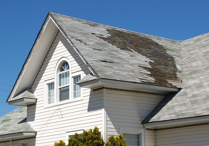Roof repair after storm damage by K. and M. Construction of MN LLC